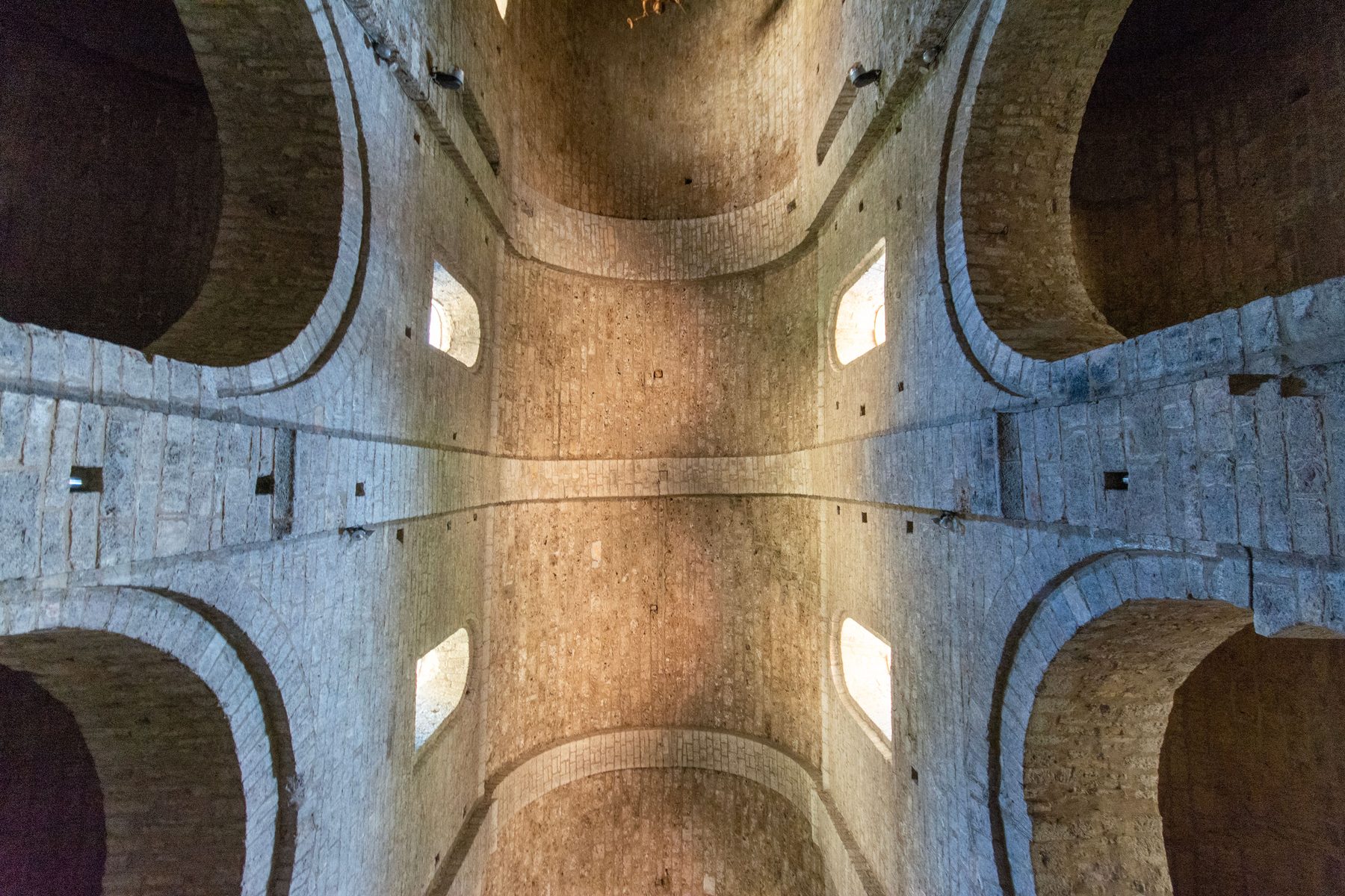 Restored interior with a brick vaulted ceiling