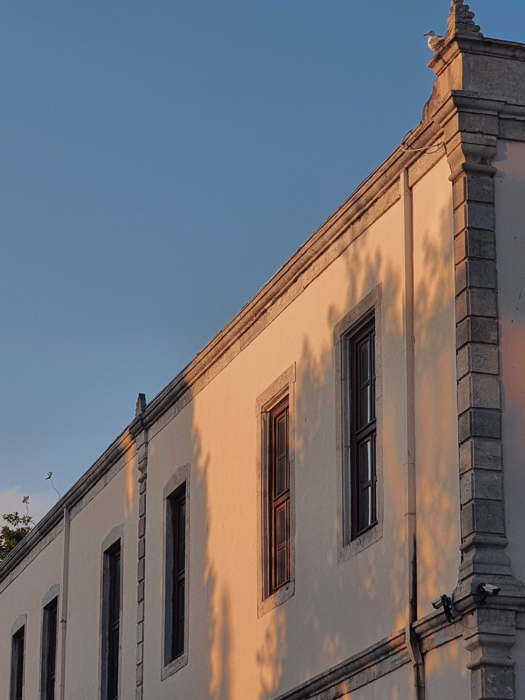 A restored Beyoğlu building at dusk